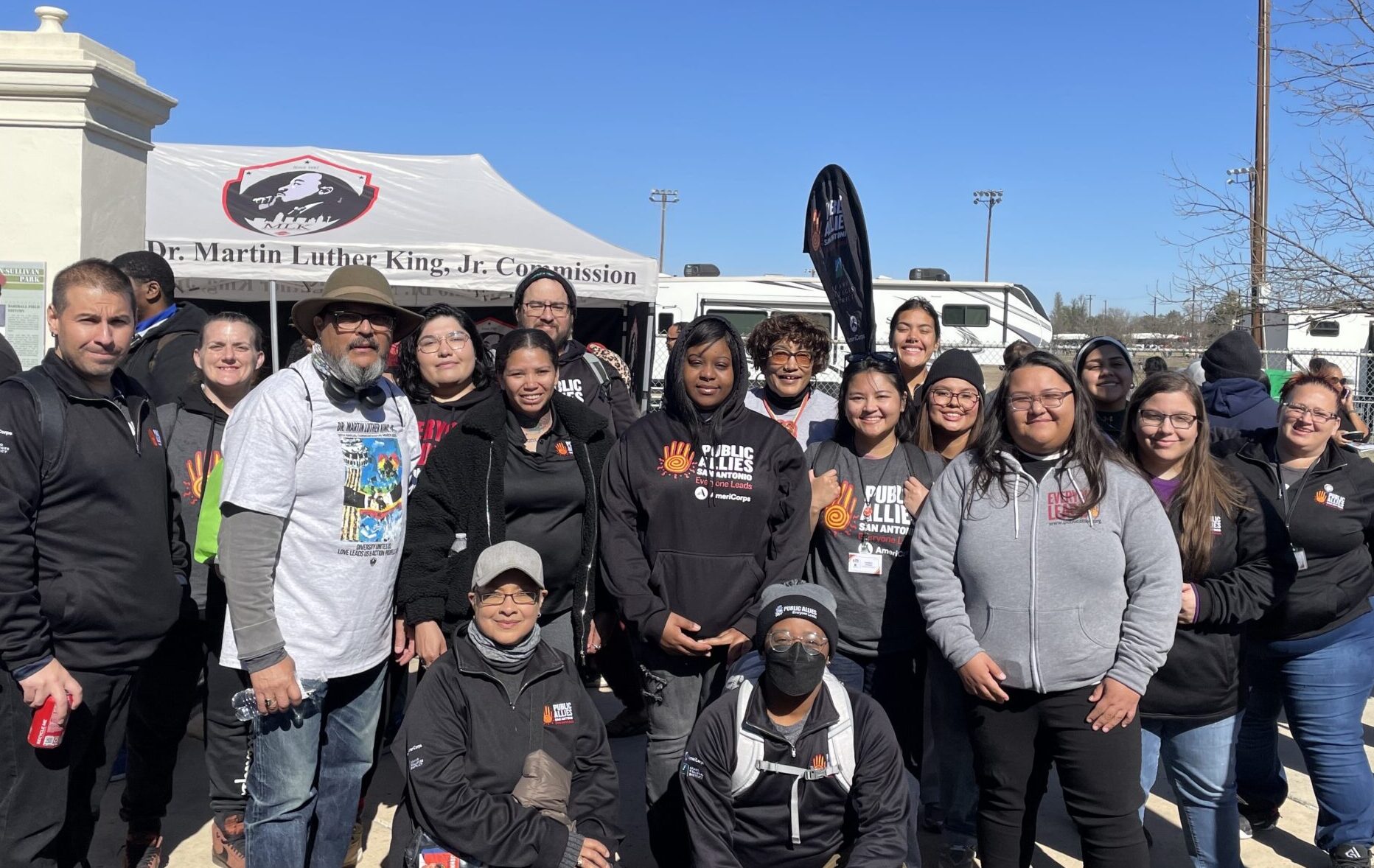 Public Allies San Antonio members and staff smiling together at a MLK Day event